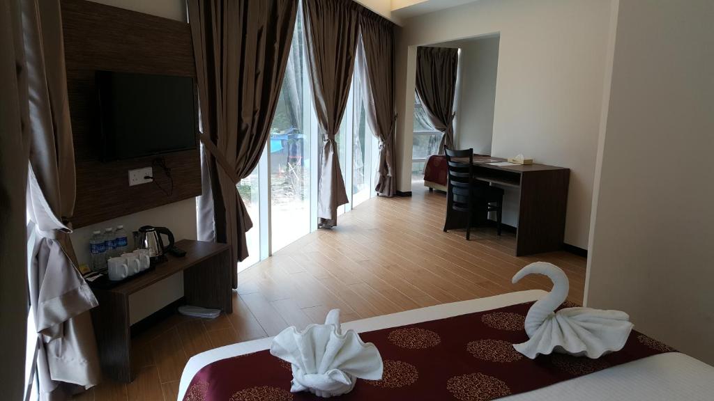Postel nebo postele na pokoji v ubytování Nex Hotel Johor Bahru