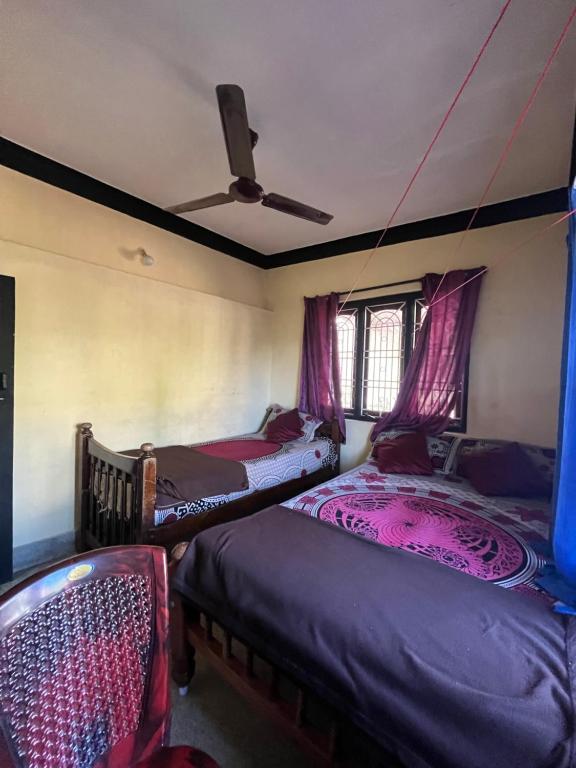 Postel nebo postele na pokoji v ubytování Trinity Villa