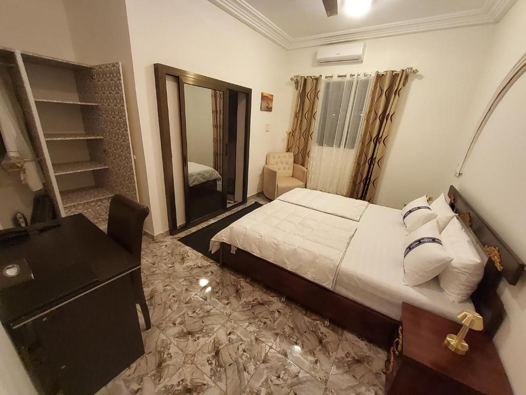 Postel nebo postele na pokoji v ubytování Comfort Suites