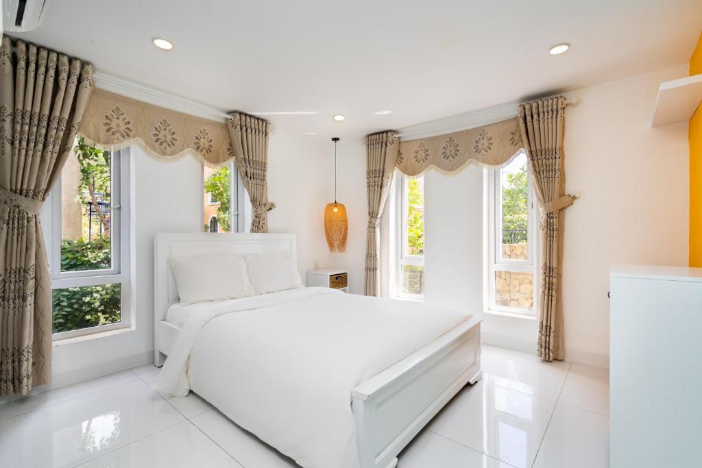 Postel nebo postele na pokoji v ubytování Bãi Dâu Homestay Vũng Tàu ZZZZ