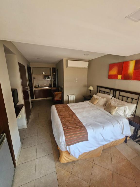 Ένα ή περισσότερα κρεβάτια σε δωμάτιο στο Caseros1