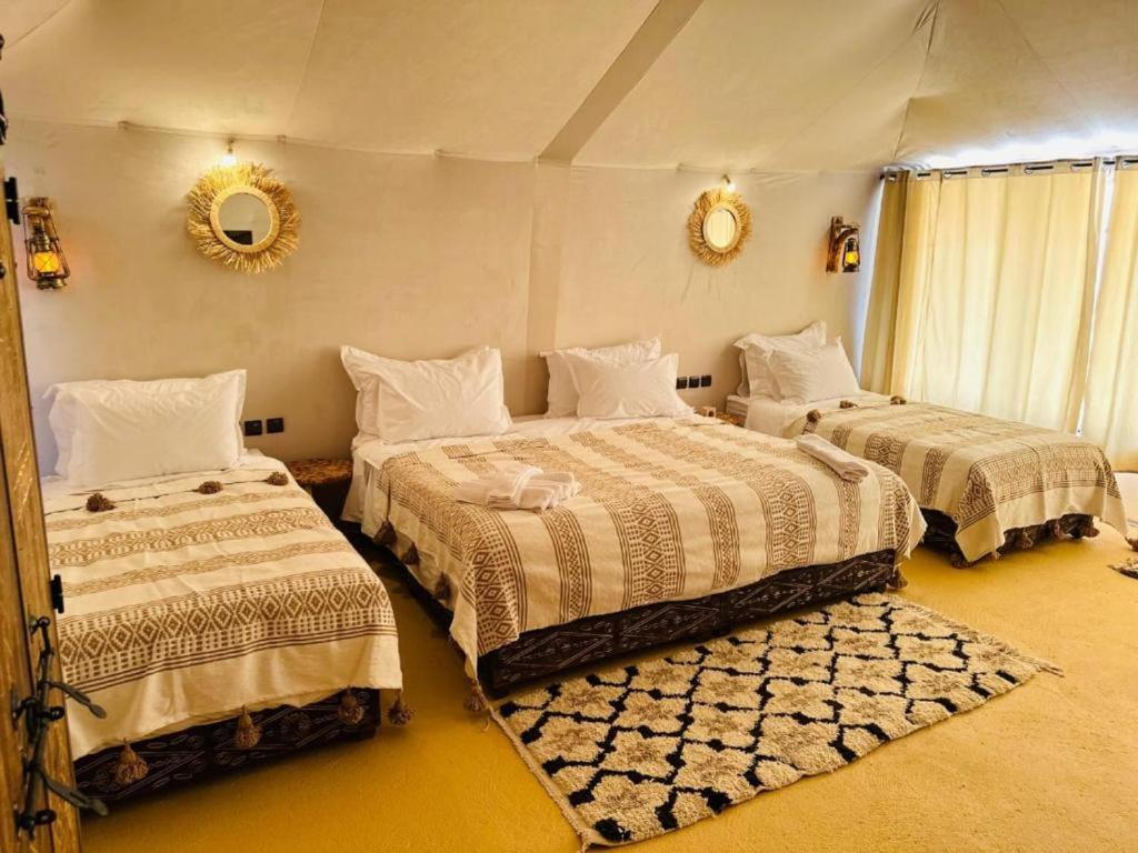 Postel nebo postele na pokoji v ubytování Sinbad luxury camp