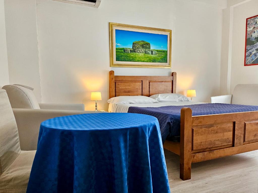 Un pat sau paturi într-o cameră la Affittacamere Miri