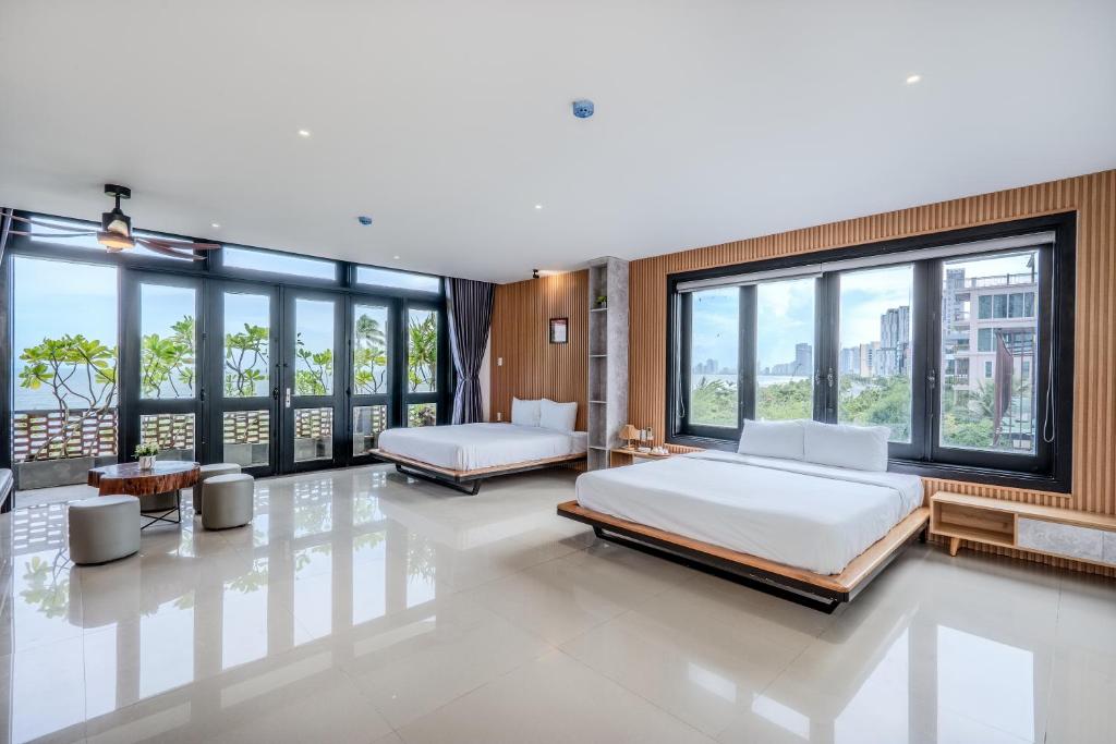 Ένα ή περισσότερα κρεβάτια σε δωμάτιο στο Svy Ocean View Villa - Beachfront - Only 20m to the Beach