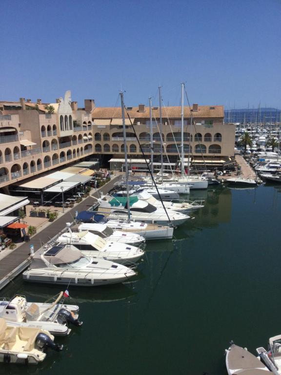 a group of boats are docked in a harbor at L'Étoile sous les Pins - La Loge in Hyères
