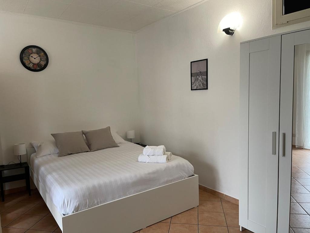 Postel nebo postele na pokoji v ubytování Angolo Relax Milano - Como