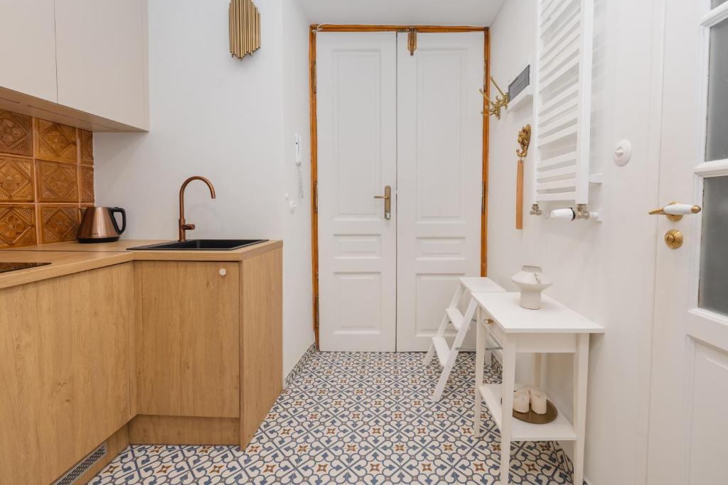 Η κουζίνα ή μικρή κουζίνα στο Boho Park Retreat - Kraków Parkowa 1a