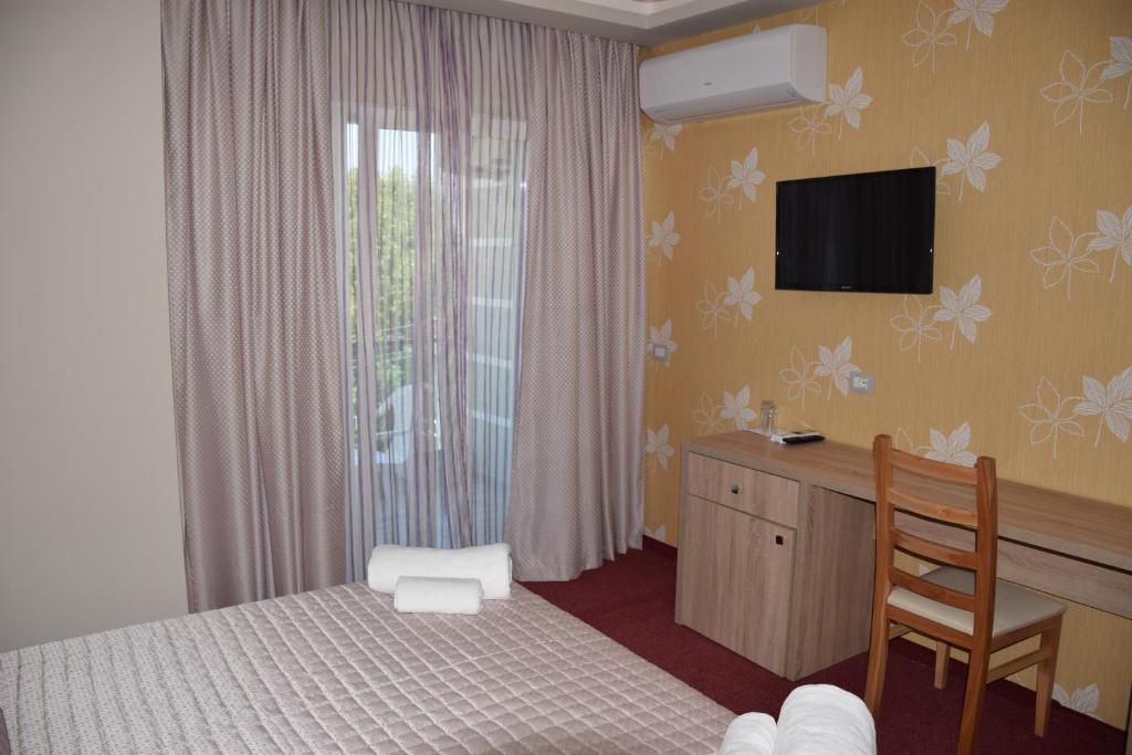 Postel nebo postele na pokoji v ubytování Hotel Pogradeci 2