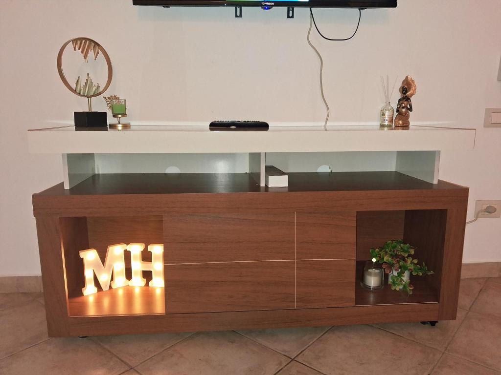 TV a/nebo společenská místnost v ubytování Miguel House