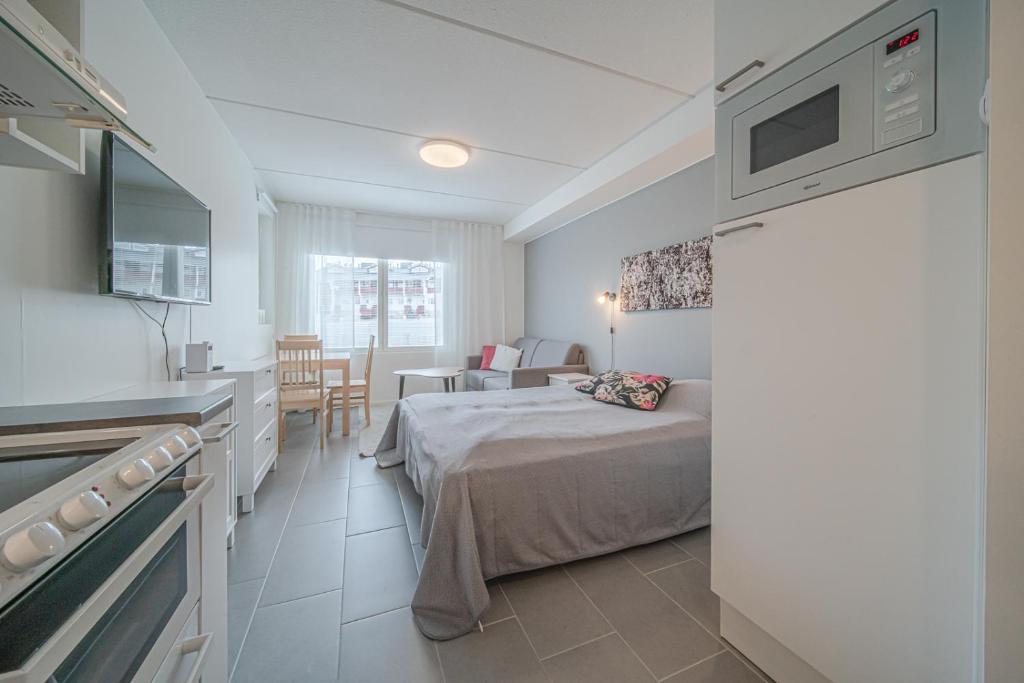 Postel nebo postele na pokoji v ubytování Sisu Stay Studio Jetset Levi