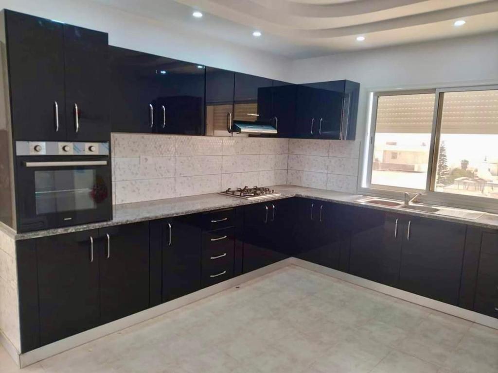 Kuchyň nebo kuchyňský kout v ubytování Dar zoghlami