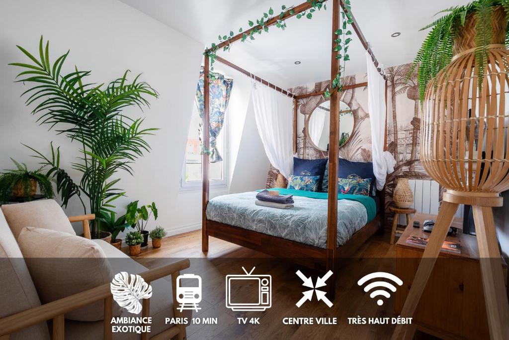 a bedroom with a canopy bed in a room with plants at Studio Exotique Hyper-Centre Enghien 12min Paris in Enghien-les-Bains