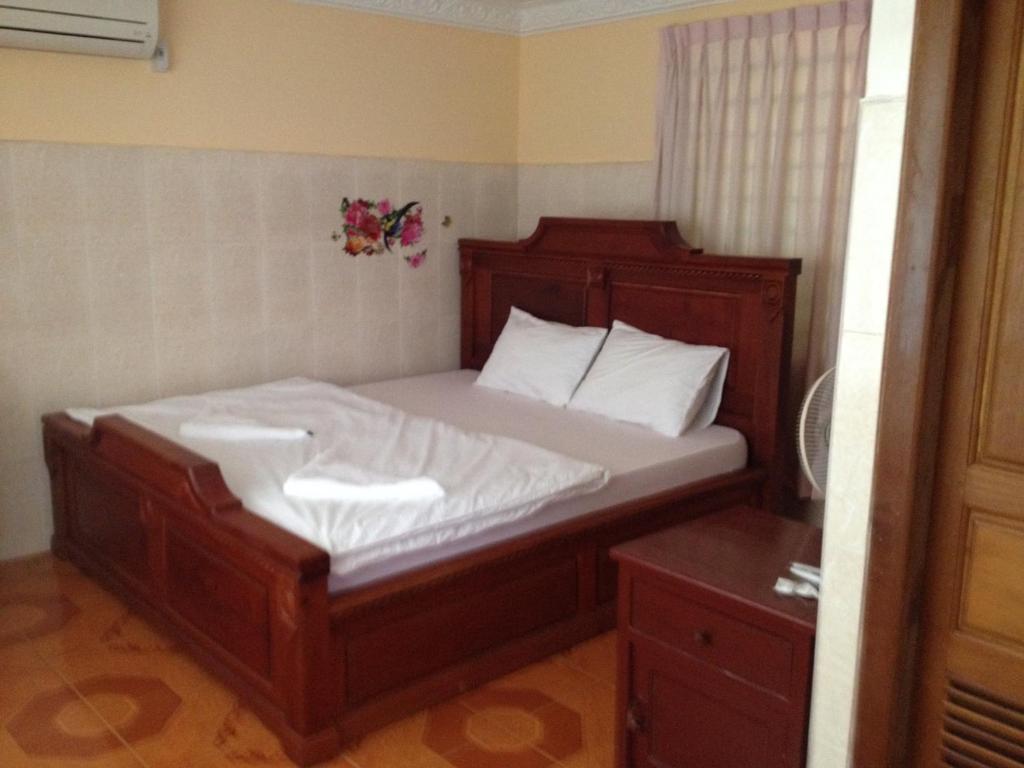 Postel nebo postele na pokoji v ubytování 139 Guest House