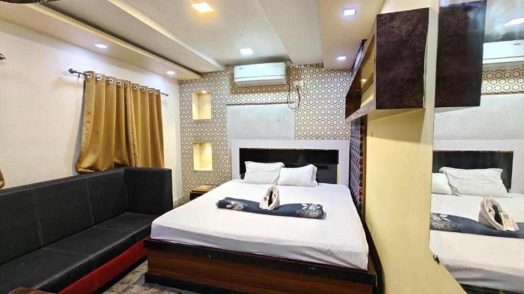 Postel nebo postele na pokoji v ubytování Hotel Royal Stay