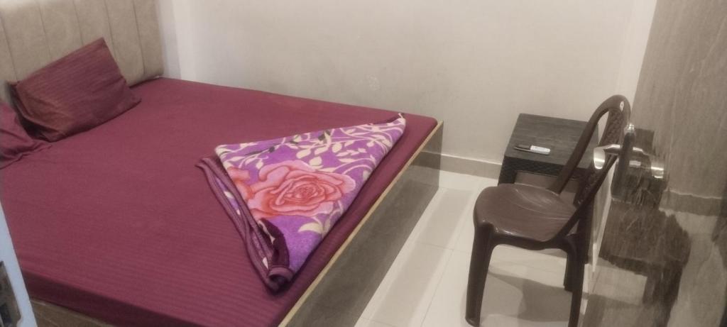 Voodi või voodid majutusasutuse Kashi kedar paying guest house toas