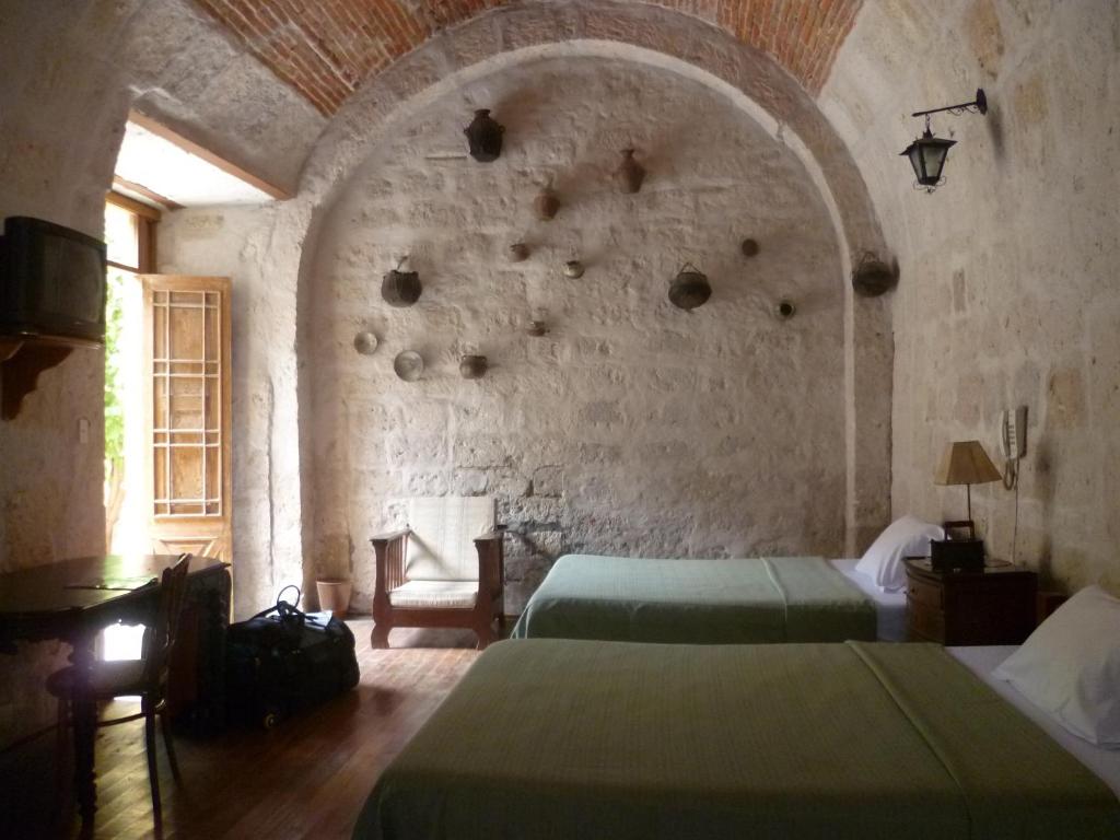 Postel nebo postele na pokoji v ubytování La Casa de Melgar