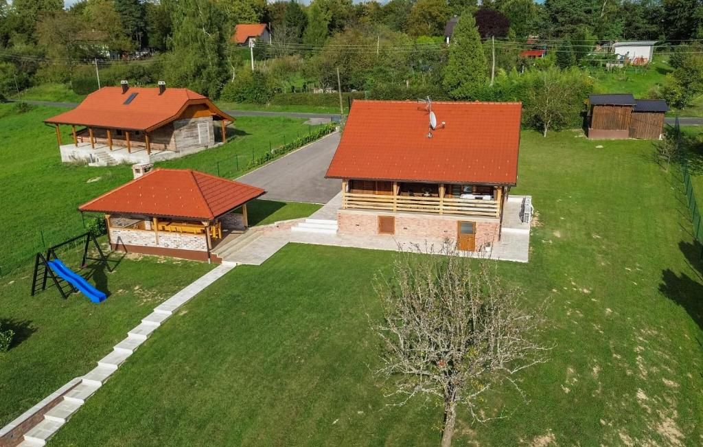 an overhead view of a house with an orange roof at Awesome Home In Jamnica Pisarovinska With Sauna in Jamnica Pisarovinska