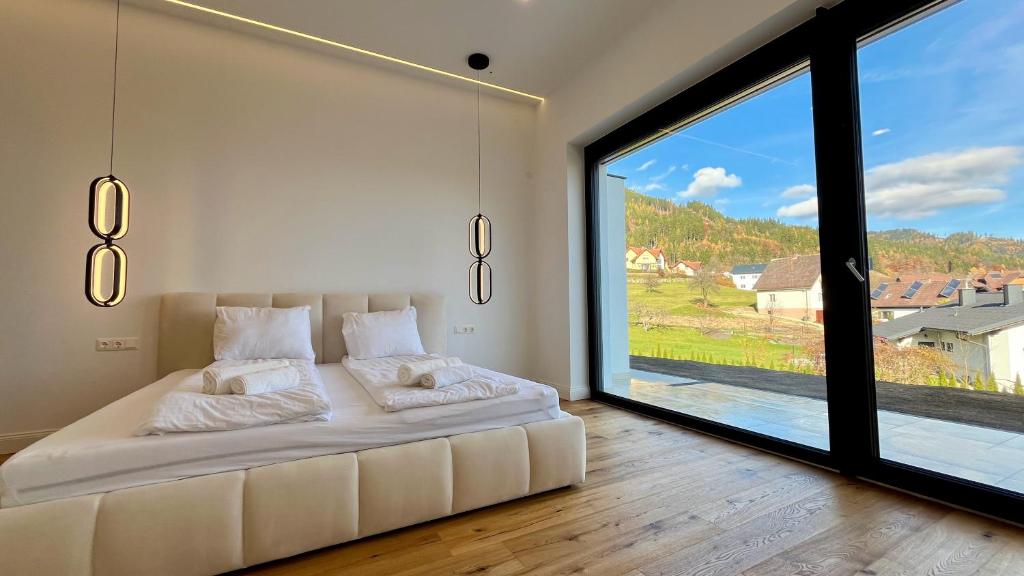 Postel nebo postele na pokoji v ubytování Alpine Loft