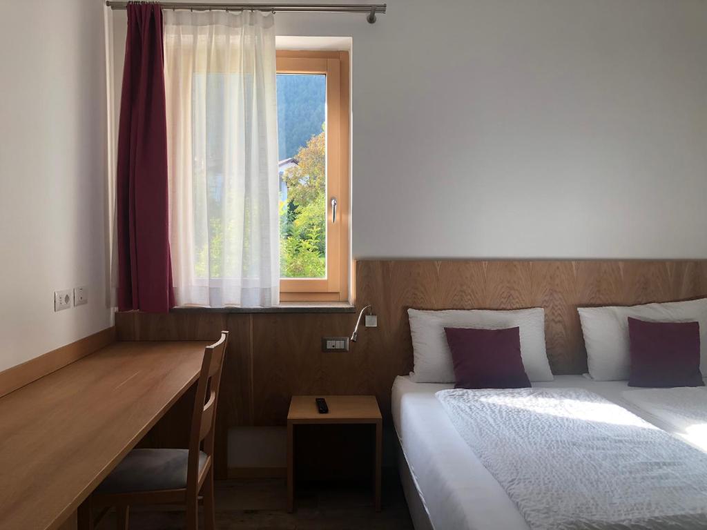 Кровать или кровати в номере Agriturismo Girasole