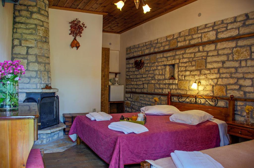 Postel nebo postele na pokoji v ubytování Guesthouse Gonia