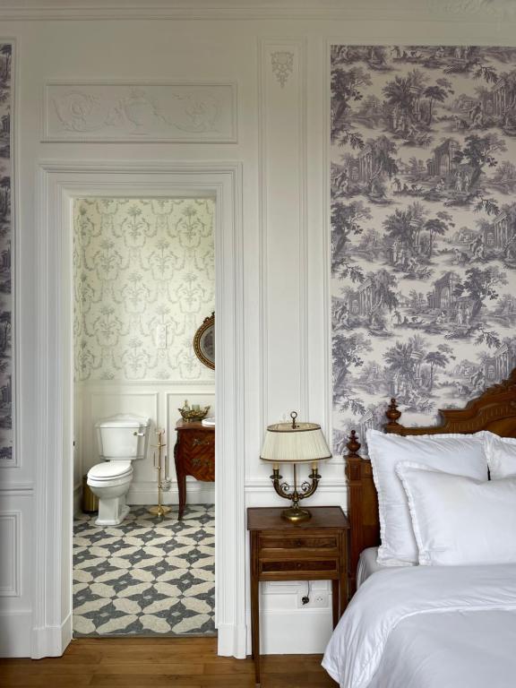 Postel nebo postele na pokoji v ubytování House of Mailly