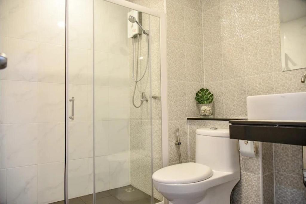 Koupelna v ubytování The Arroz Residence, Amata city, Chonburi