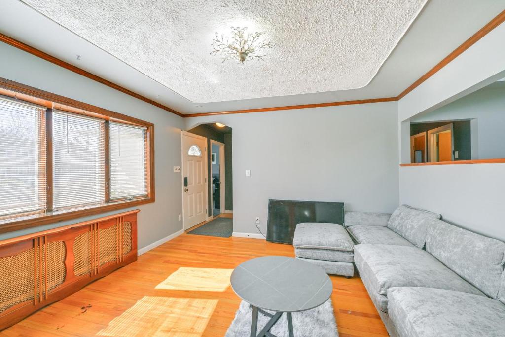 a living room with a couch and a tv at Choice home in West Babylon