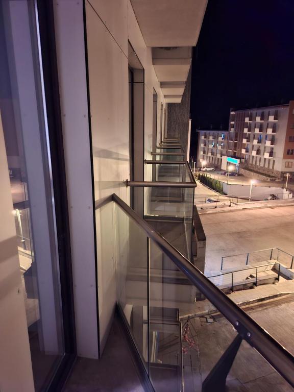 a view of a stairwell in a building at night at Оrbi Palase Deluxe in Bakuriani