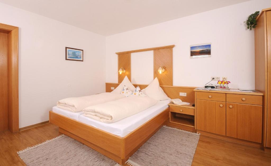 Postel nebo postele na pokoji v ubytování Haus Leonhard