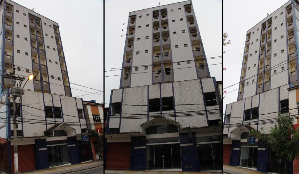 two different views of a tall building at Comfoort Hotel in Volta Redonda