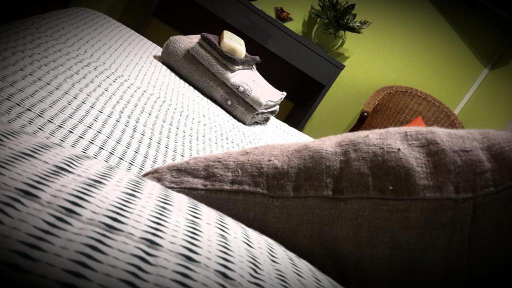 Postel nebo postele na pokoji v ubytování Om'Sleeping B&B