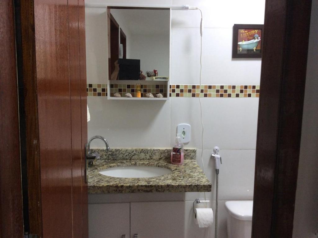 A kitchen or kitchenette at Apartamento Aconchego Do Recreio