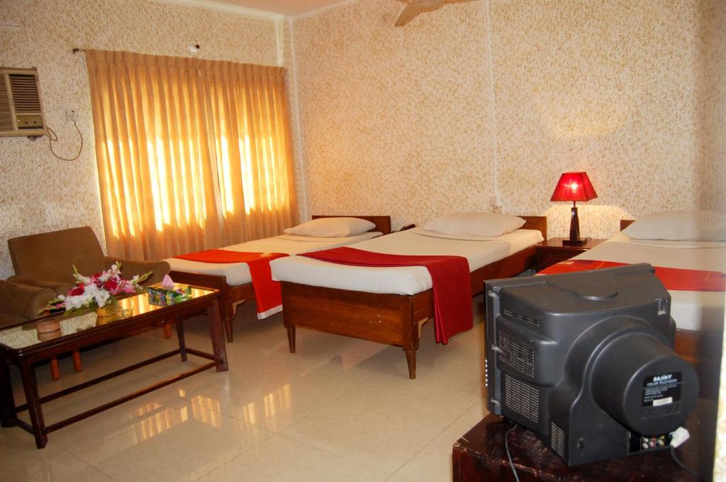 Hotel Swiss Garden International - Deluxe Dreibettzimmer