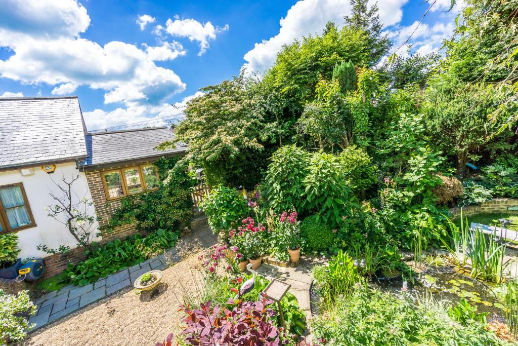 Zahrada ubytování Badgers Den - Covehurst Bay Holiday Cottage