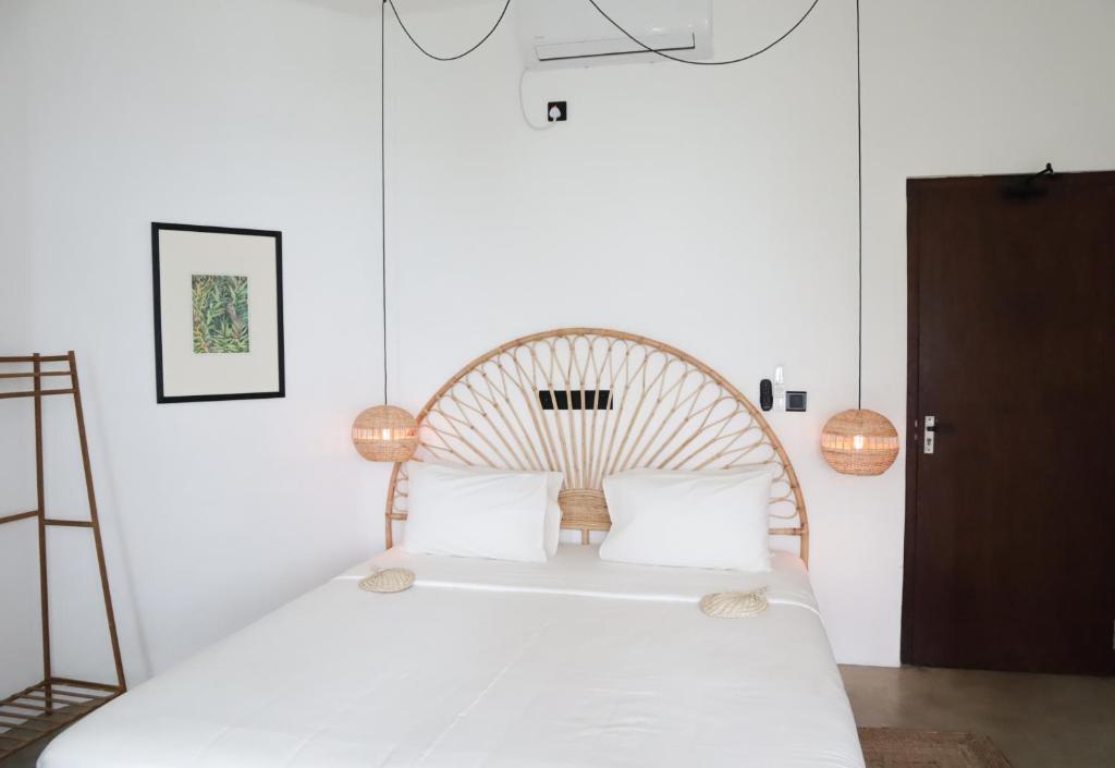 Postel nebo postele na pokoji v ubytování The Banyan Ahangama