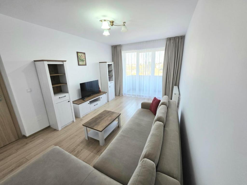 TV a/nebo společenská místnost v ubytování Luxury Apartaments in Maurer Residence by Milan-Târgu Mureș