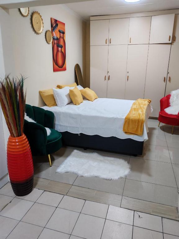 Кровать или кровати в номере Sunset Inn