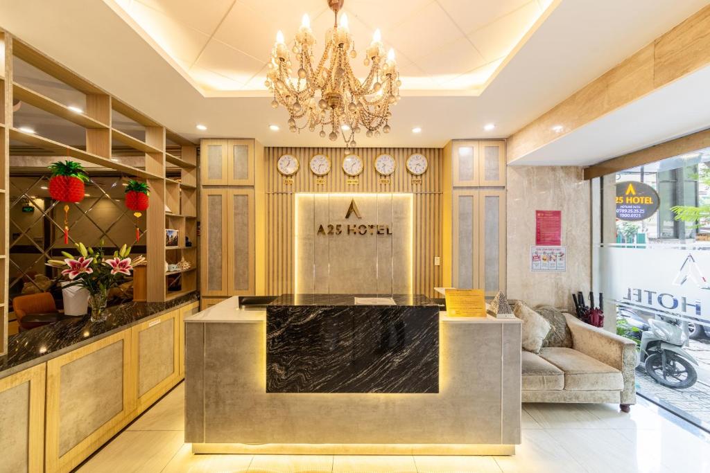 a new hotel lobby with a marble counter at A25 Hotel - 75 Lê Thị Hồng Gấm in Ho Chi Minh City