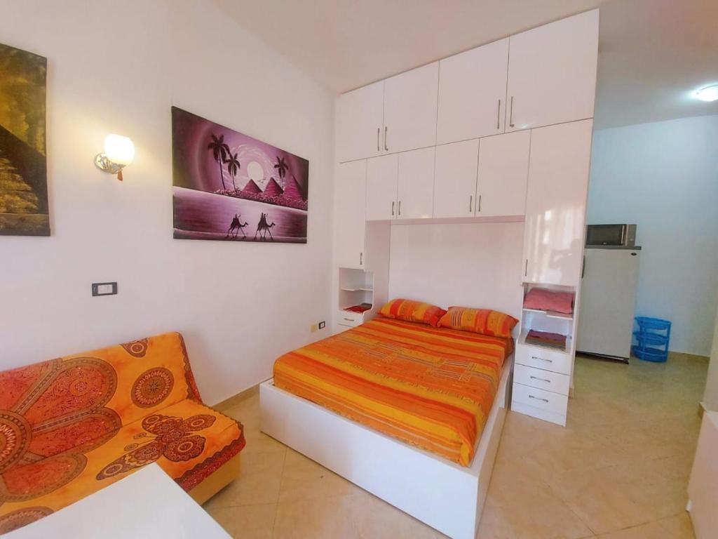 Postel nebo postele na pokoji v ubytování La Sirena Resort