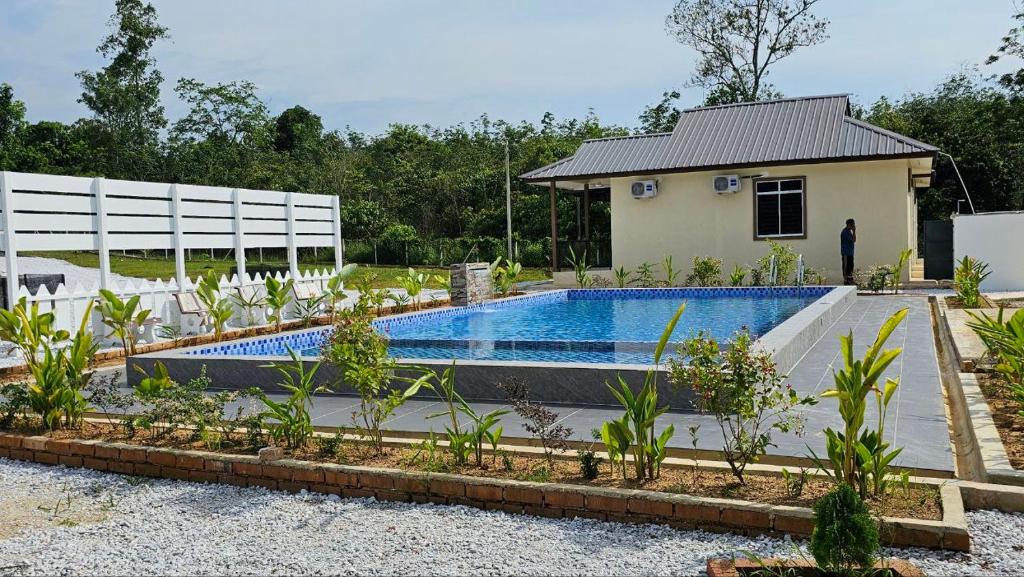 Bazén v ubytování Neera Rest House nebo v jeho okolí