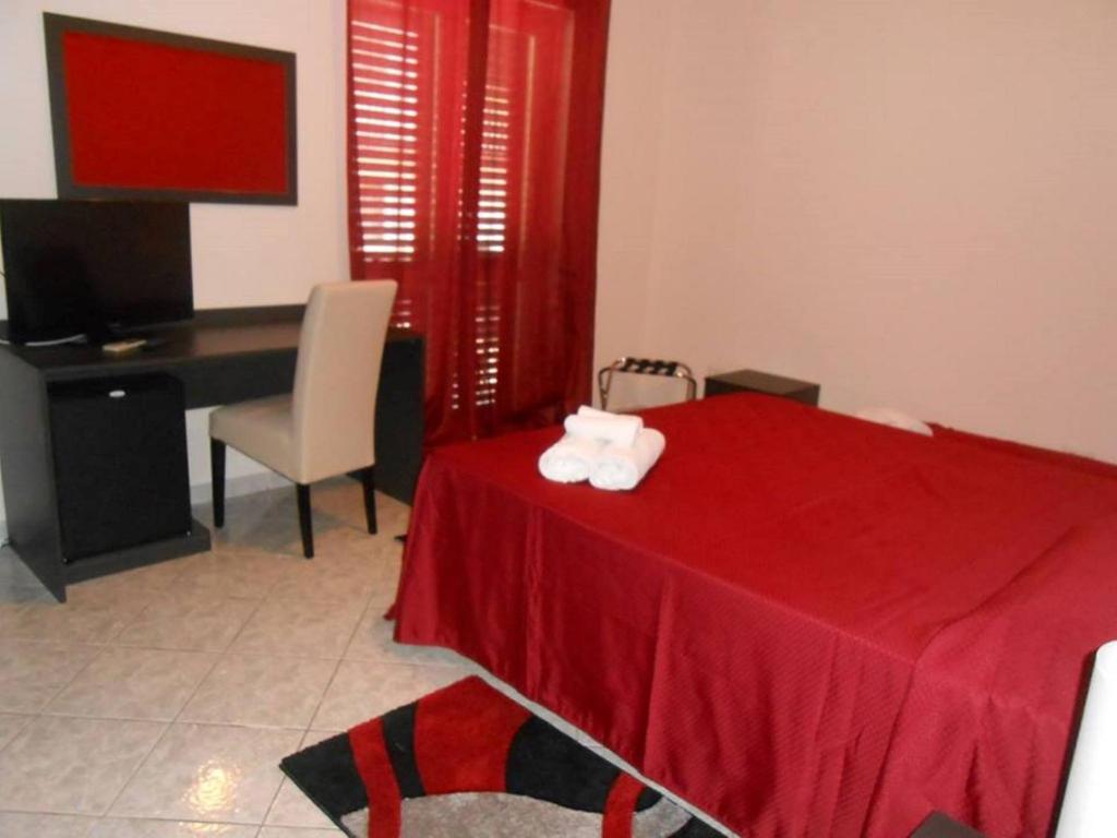 Postel nebo postele na pokoji v ubytování B&B Paradiso