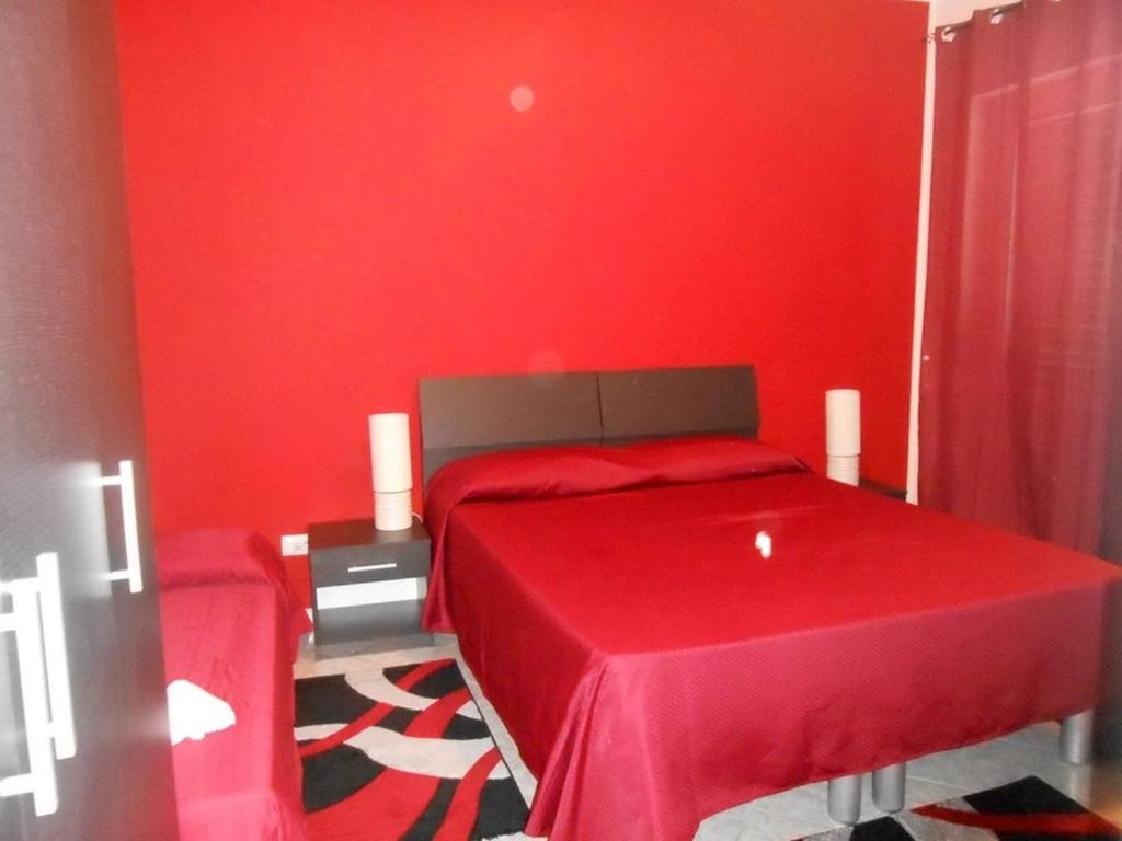 Postel nebo postele na pokoji v ubytování B&B Paradiso