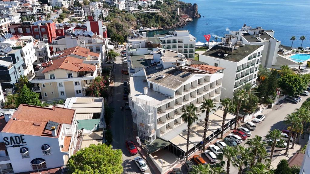 an aerial view of a city with buildings and the ocean at Prima Hotel in Antalya