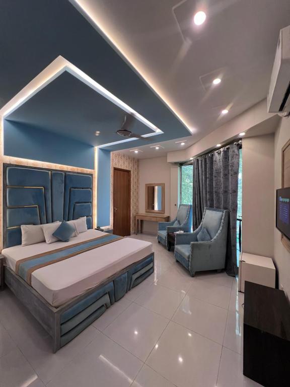 Ένα ή περισσότερα κρεβάτια σε δωμάτιο στο Park View Hotel Gulberg