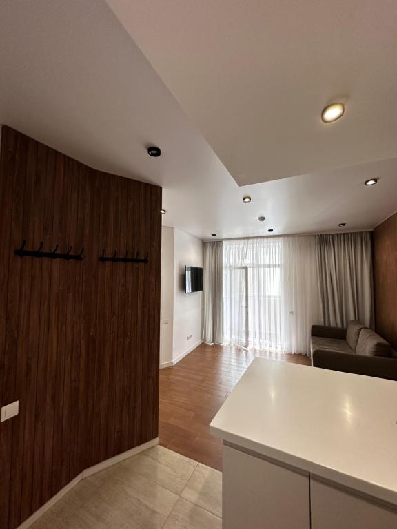 Μια τηλεόραση ή/και κέντρο ψυχαγωγίας στο Апартаменти ЖК "Сонячний Квартал"