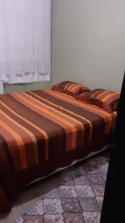 two beds sitting next to each other in a room at Tekinler Deluxe Suite in Diyarbakır