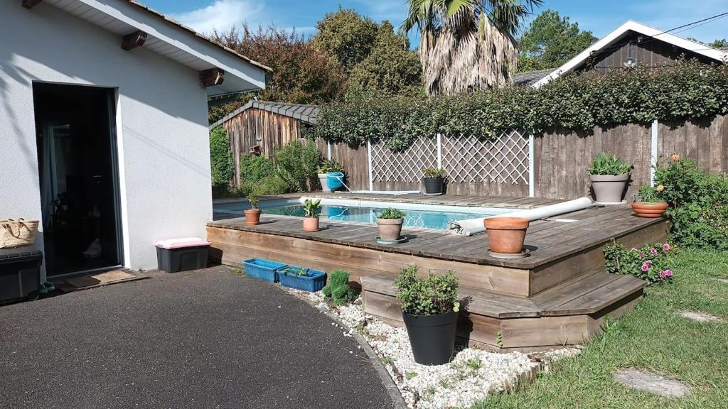 Bazén v ubytování Maison sur le bassin d'Arcachon nebo v jeho okolí