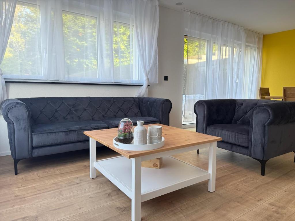 Χώρος καθιστικού στο Moderne Familienwohnung mit Garten & E-Ladestation