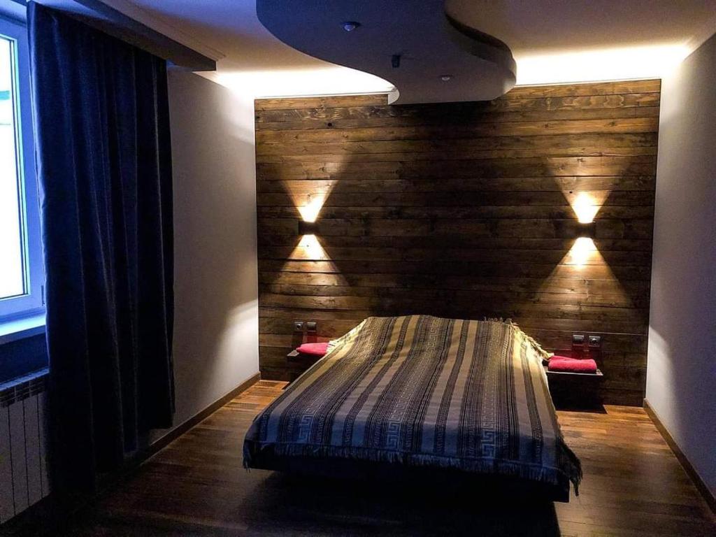 Ένα ή περισσότερα κρεβάτια σε δωμάτιο στο Sauna Cheremosh