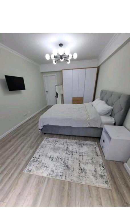 Llit o llits en una habitació de Sanmarko